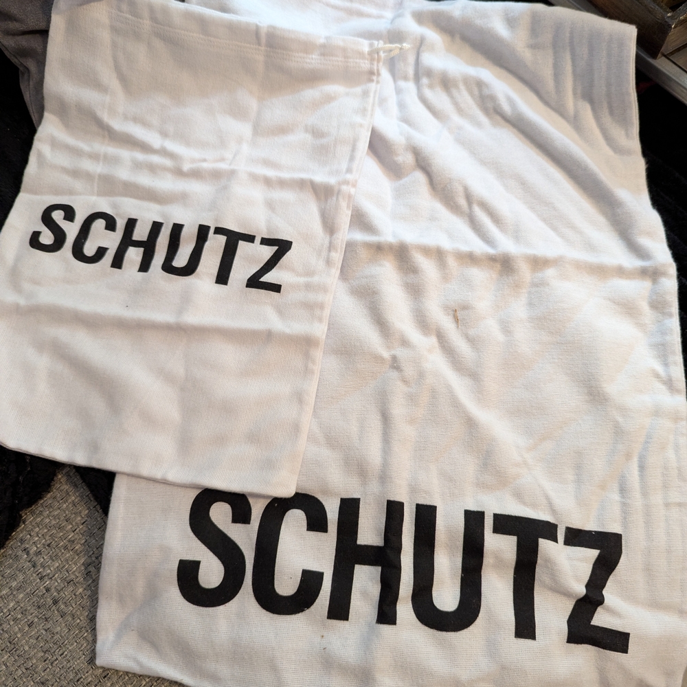 SCHUTZ White Bags with Black Logo